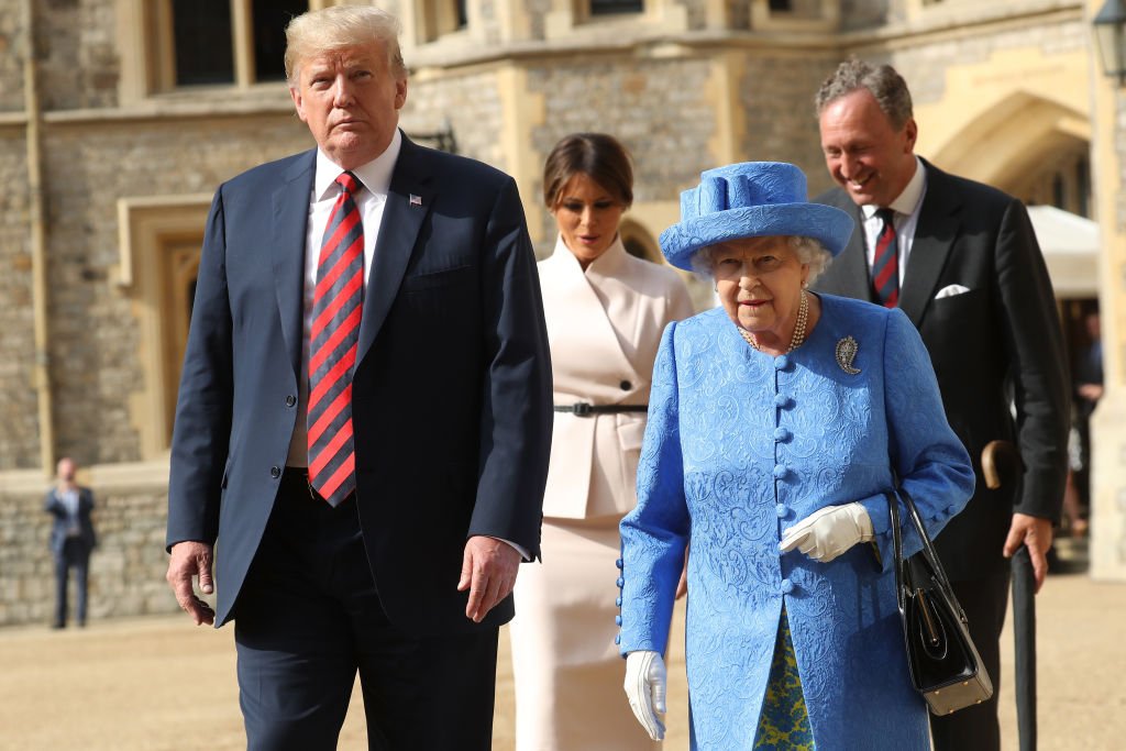 Entre protestas, reina Isabel recibe a Trump 